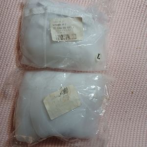 Two large bird cage seed guards,  unopened. Never used.